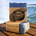 Bar of soap with packaging labeled 'Niagara Craft Soap' against a backdrop of Niagara Falls.