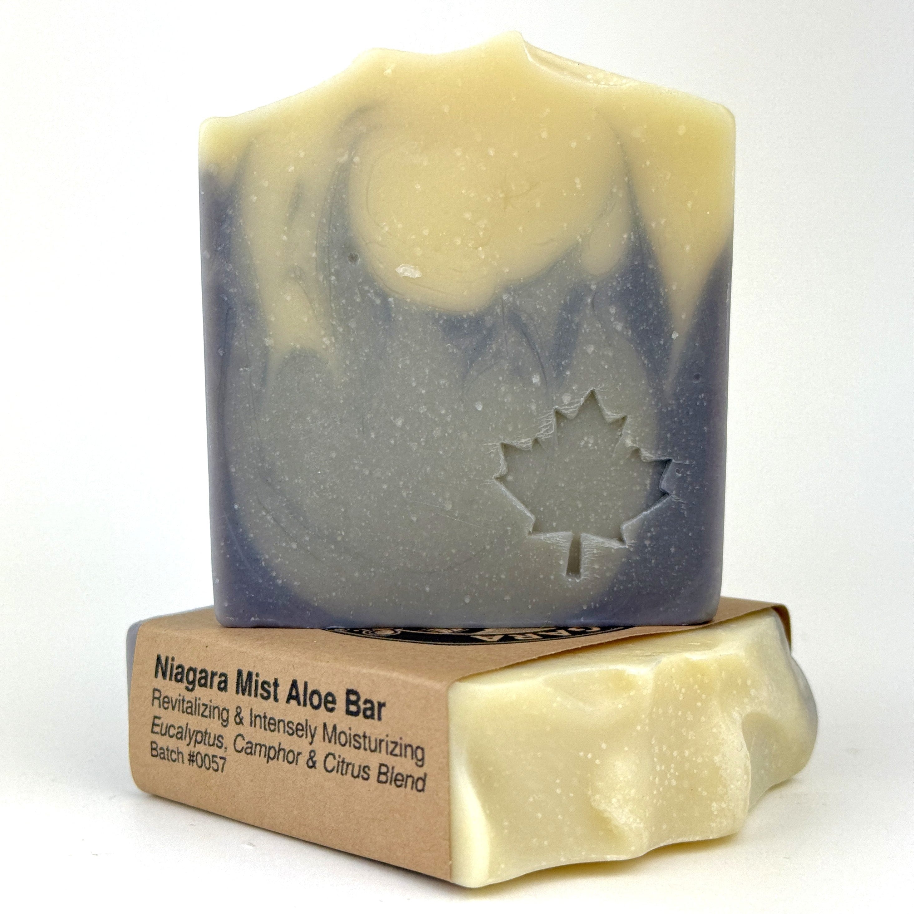 Bar of soap with a visible brand logo on a white background