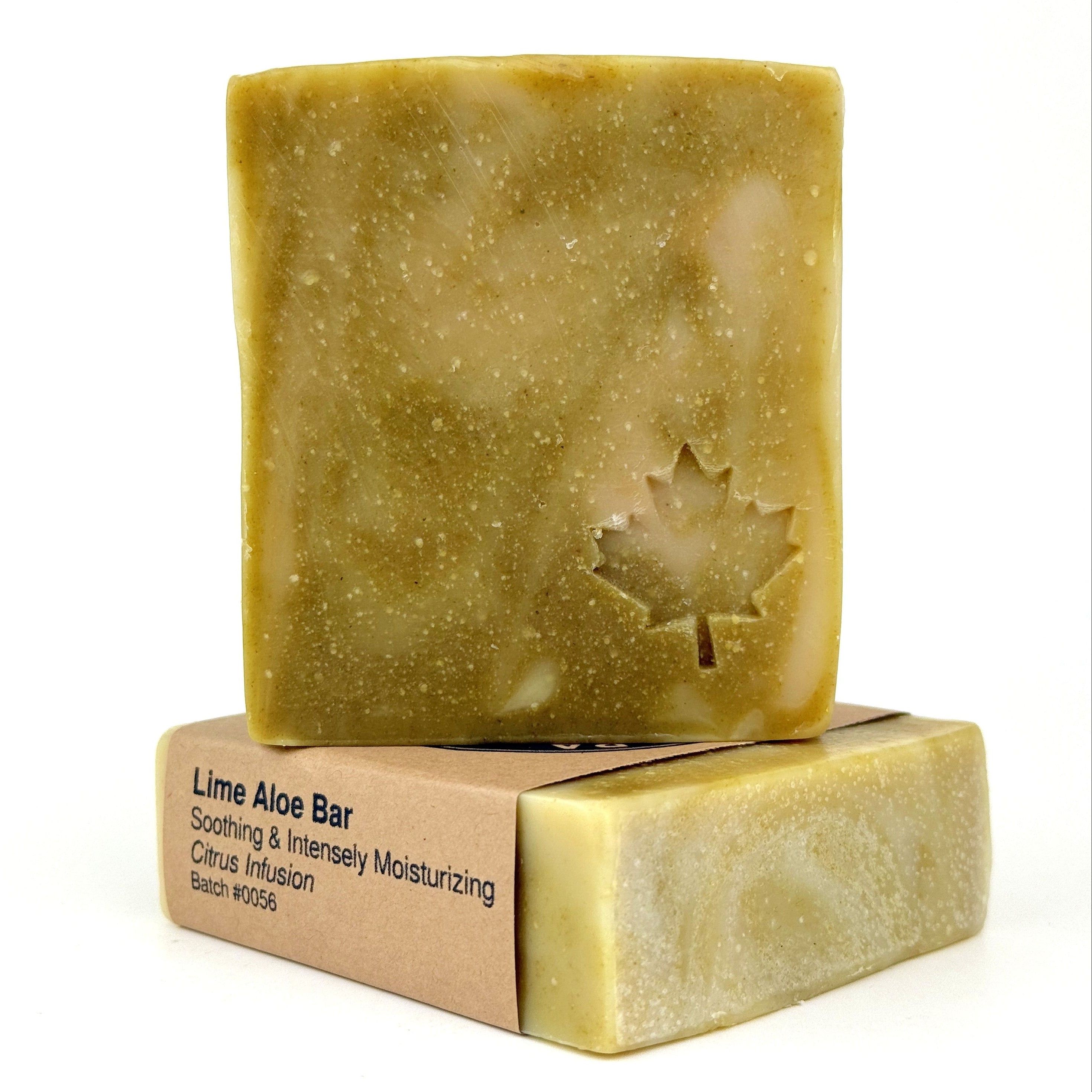 Bar of soap with a cardboard label on a white background