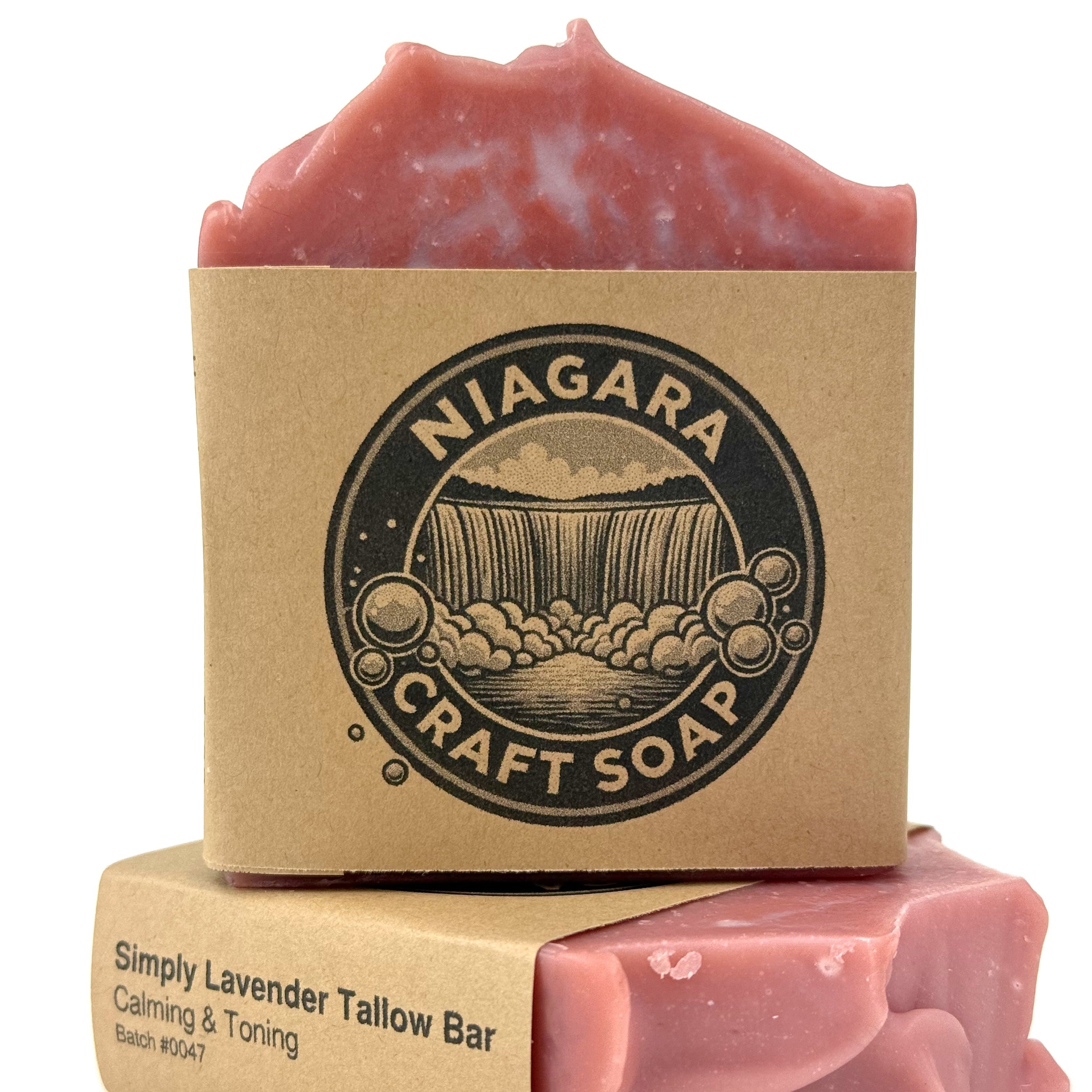 Pink soap bar with Kraft paper packaging featuring 'Niagara Craft Soap' logo on a white background