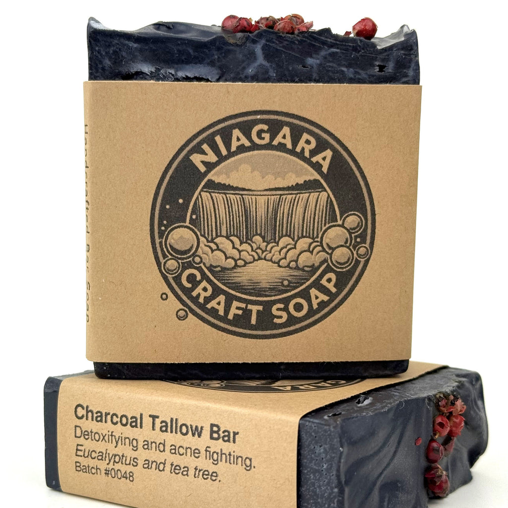 Bar of soap with a cardboard wrapper featuring 'Niagara Soap' branding on a white background.